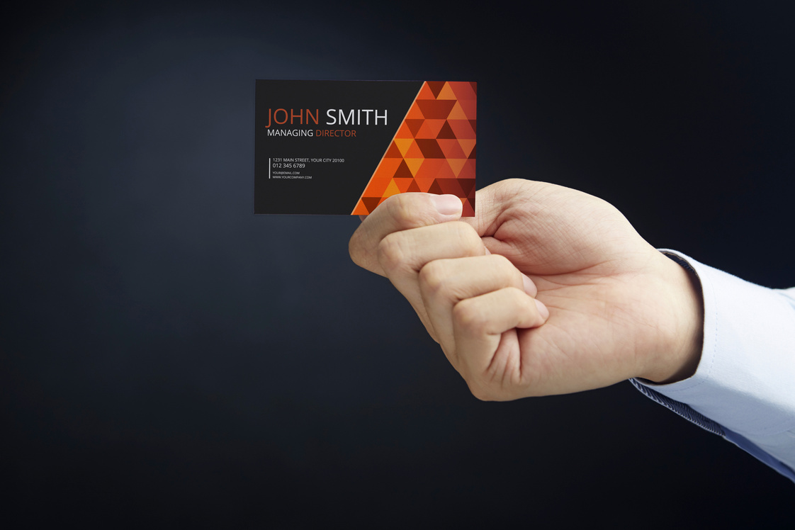 Hand presenting business card concept